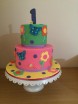 Bright first bday cake