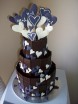 Michelle's engagement cake with choc chards and purple and white hearts